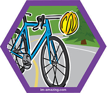 Blue road bike with yellow helmet on hexagon magnet, I'm amazing magnetic personality