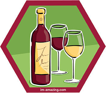 glasses of red and white wine with bottle on hexagon magnet