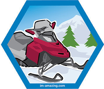 snowmobile on snow on hexagon magnet